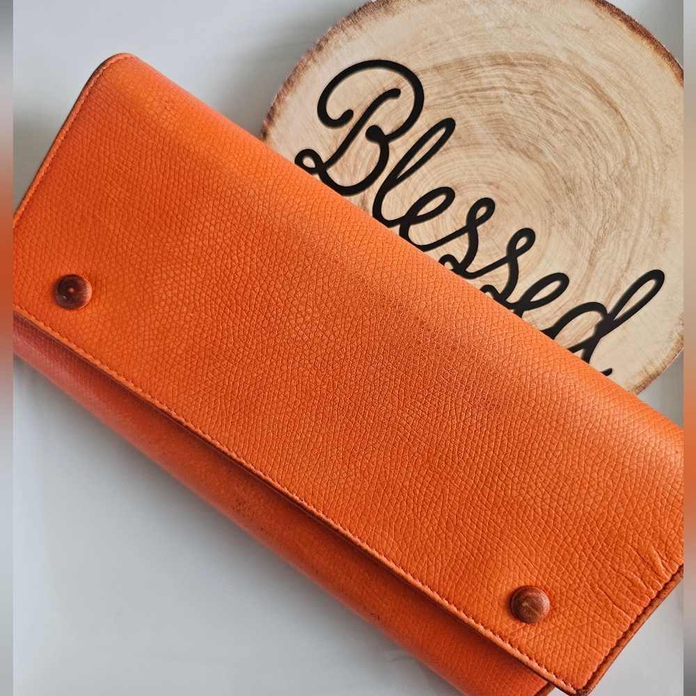 Celine Orange Wallet with Leather Texture and Flap Closure